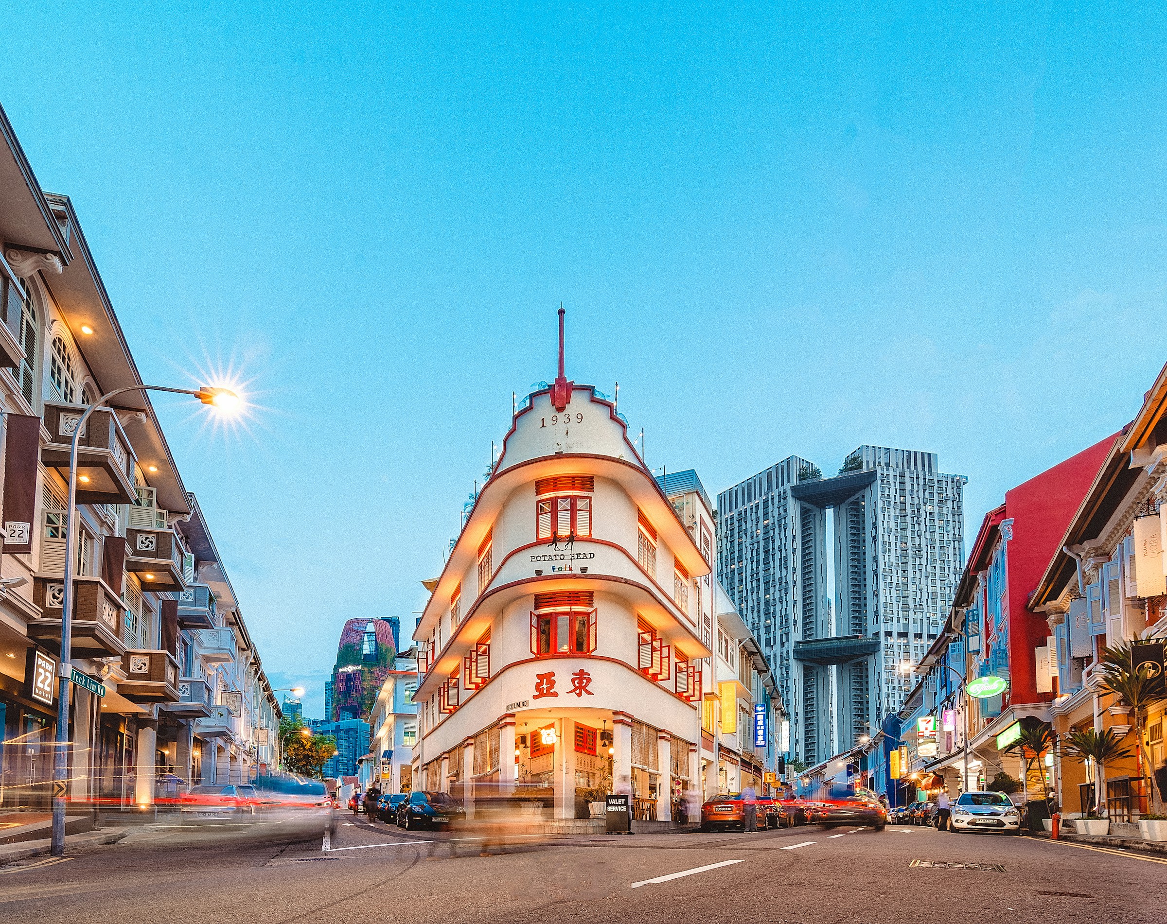 Potato Head shophouse at Keong Saik Road, Singapore — blue hour with warm interior glow